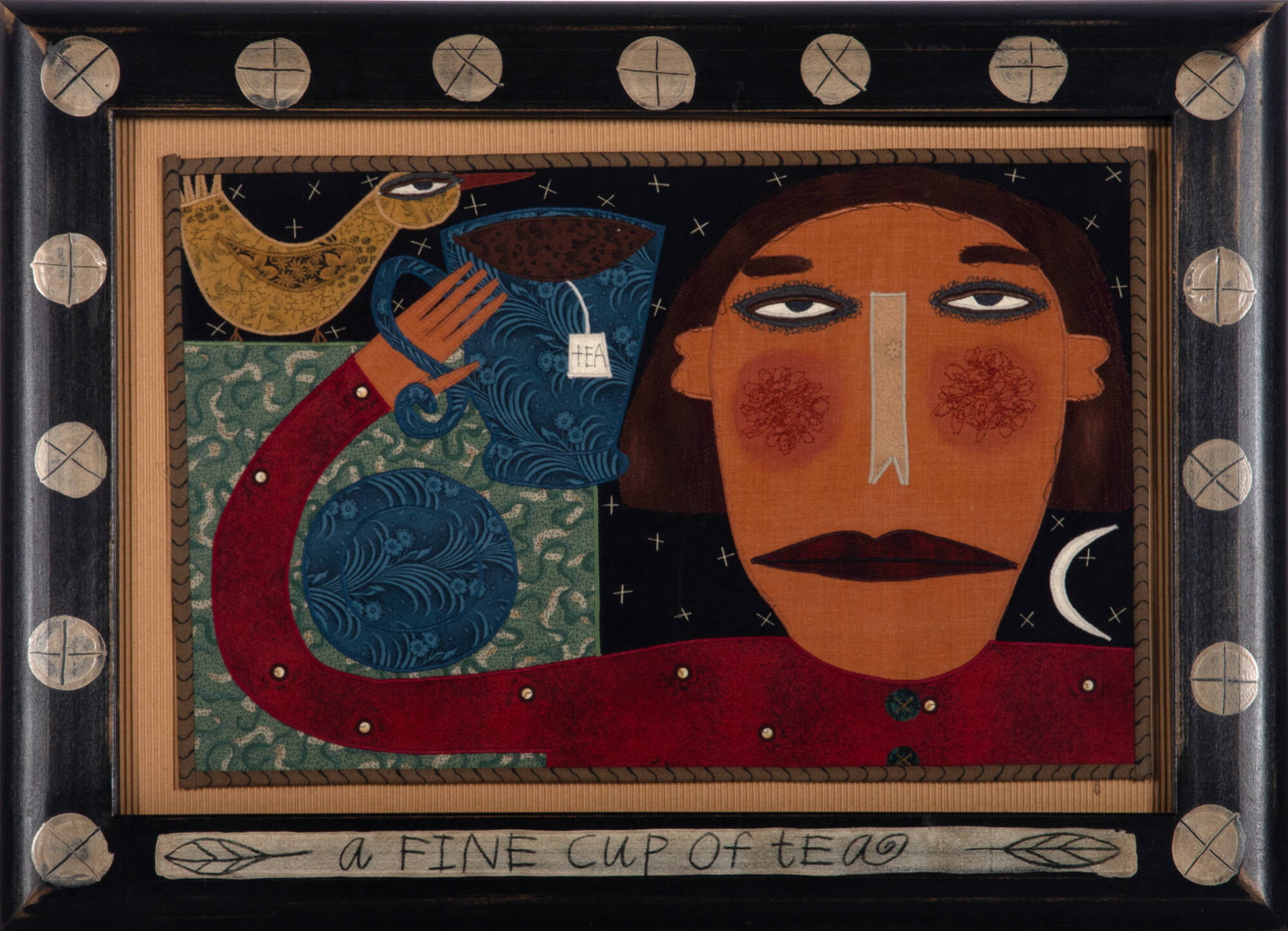 Textile piece of a person holding up a cup of tea with a yellow bird.